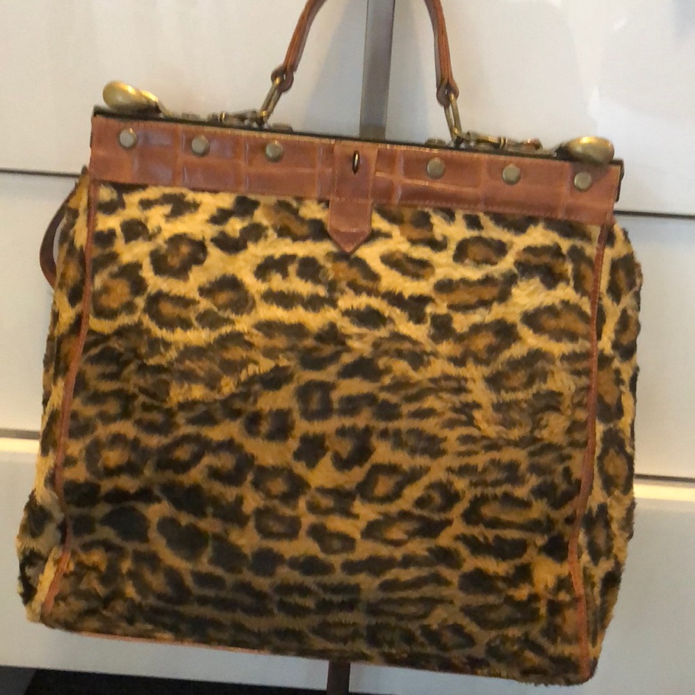 Andre Cellini vintage leopard fur bag